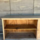 Old counter with sliding doors in raw wood