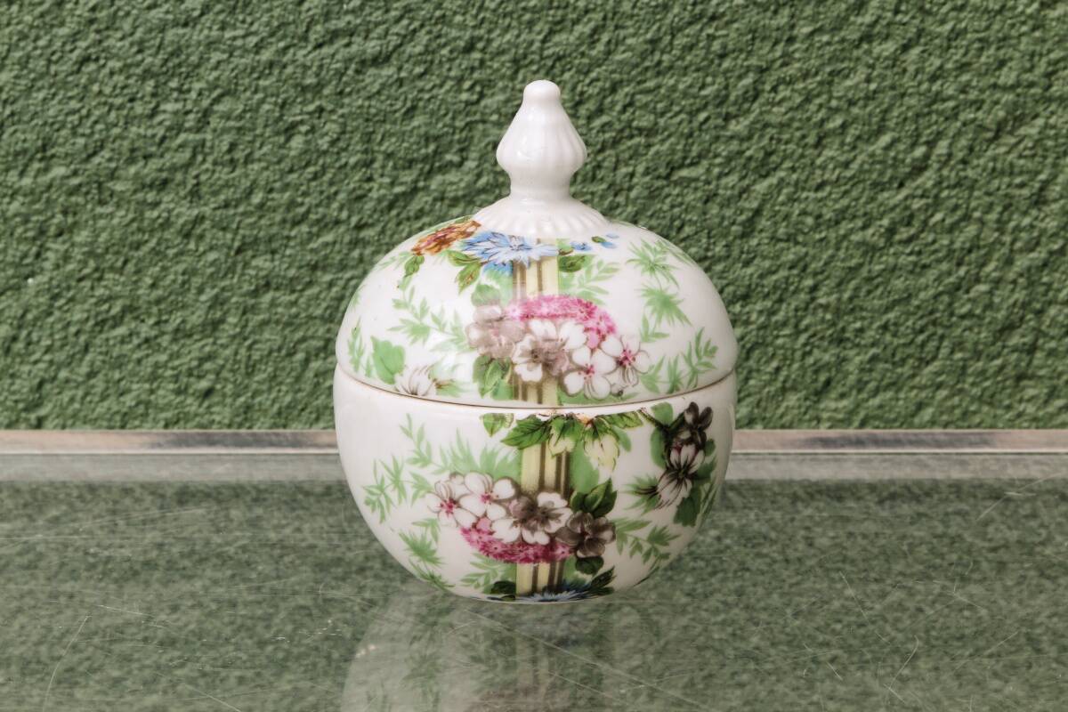 Set of 3 floral porcelain sweet jars from Paris.