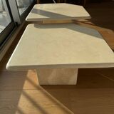 Pair of travertine nesting tables