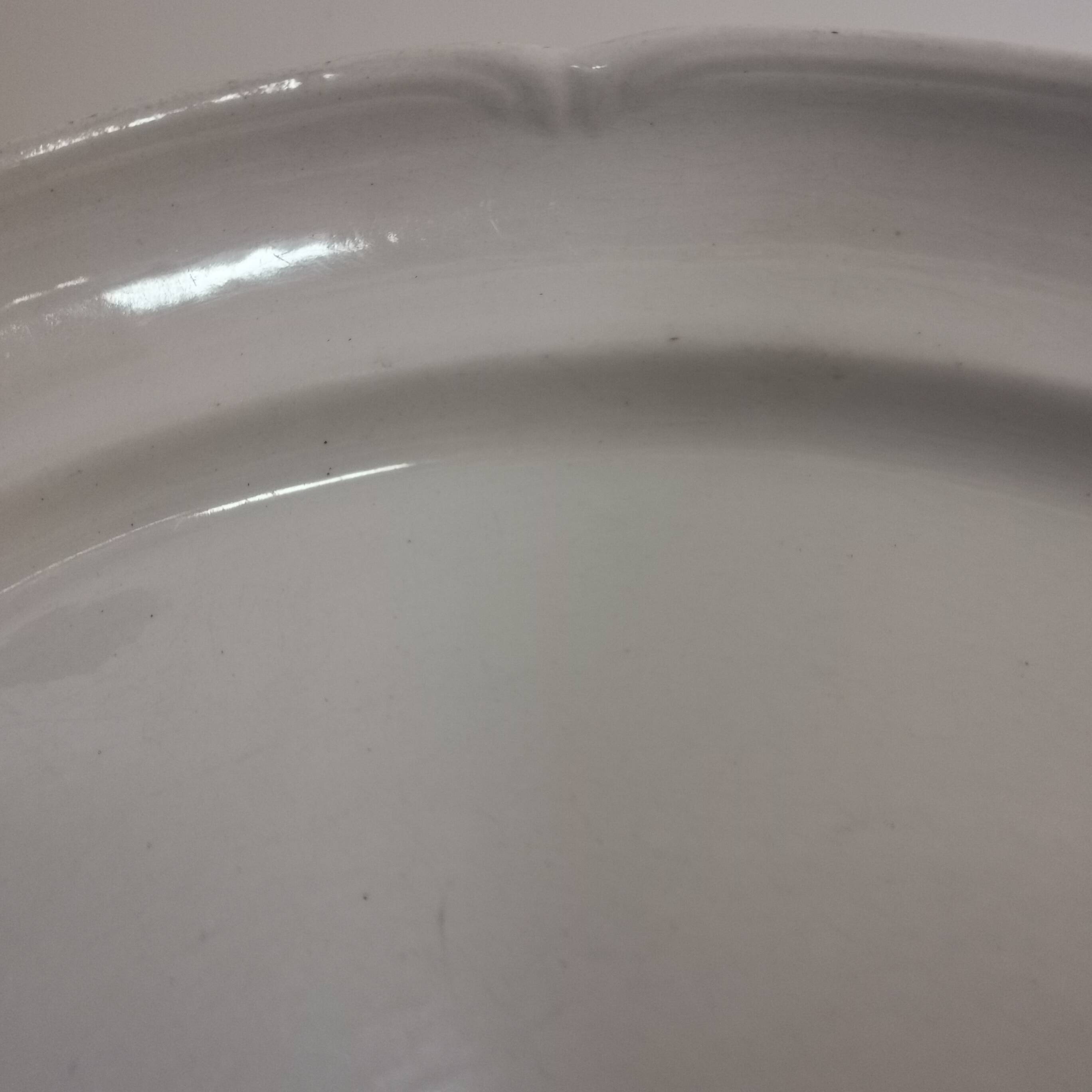 Oval white earthenware dish stamped K&G, Lunéville