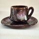 Six cups and saucers Vallauris glazed ceramic in brown and old pink.