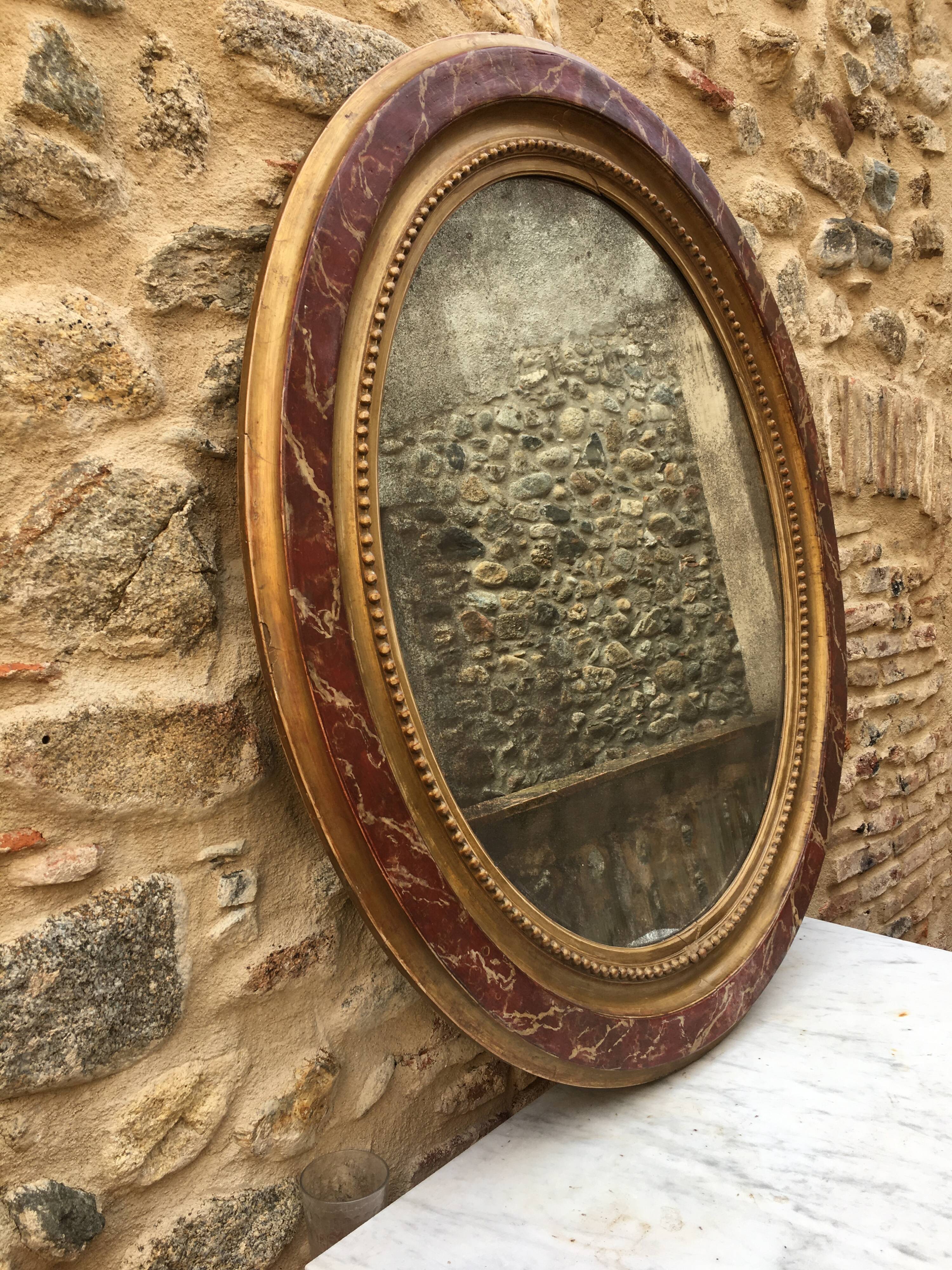 Oval gilded mirror 107x90cm