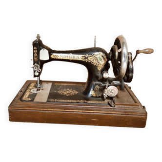 Machine à coudre Singer à main