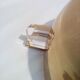 Three brass and lucite wall lights