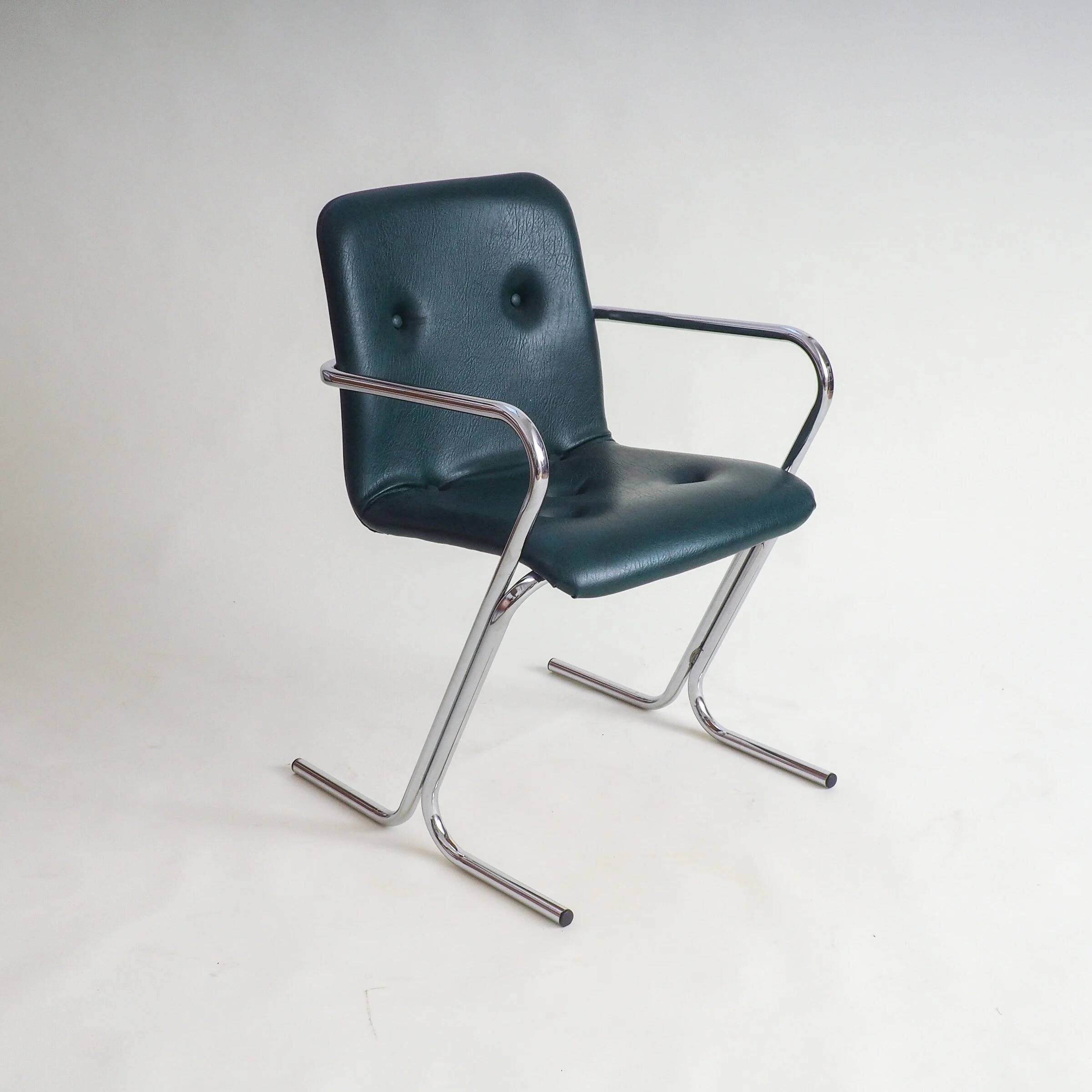 70s tubular arm chair by Tavo