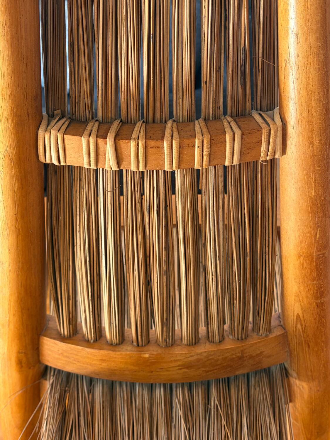 Pair of sculptural chairs in teak and rattan, Bali, 1990s
