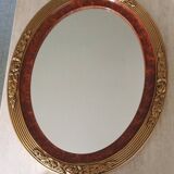 Modern oval mirror with flower decoration