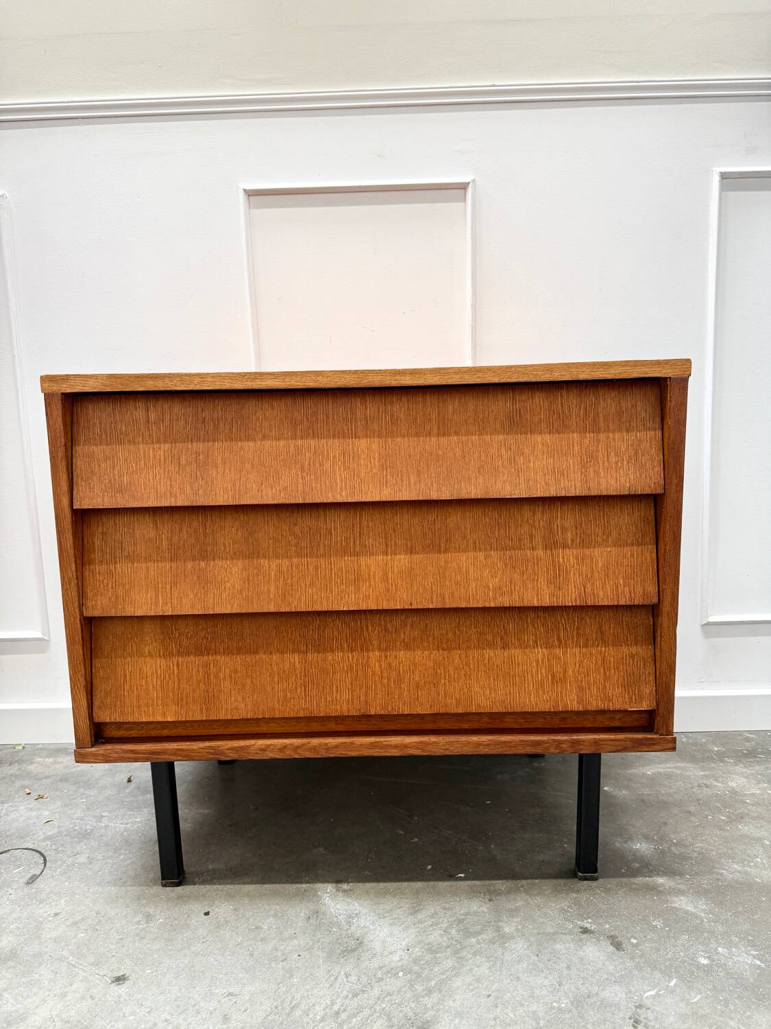 Modernist chest of drawers with slanted drawers