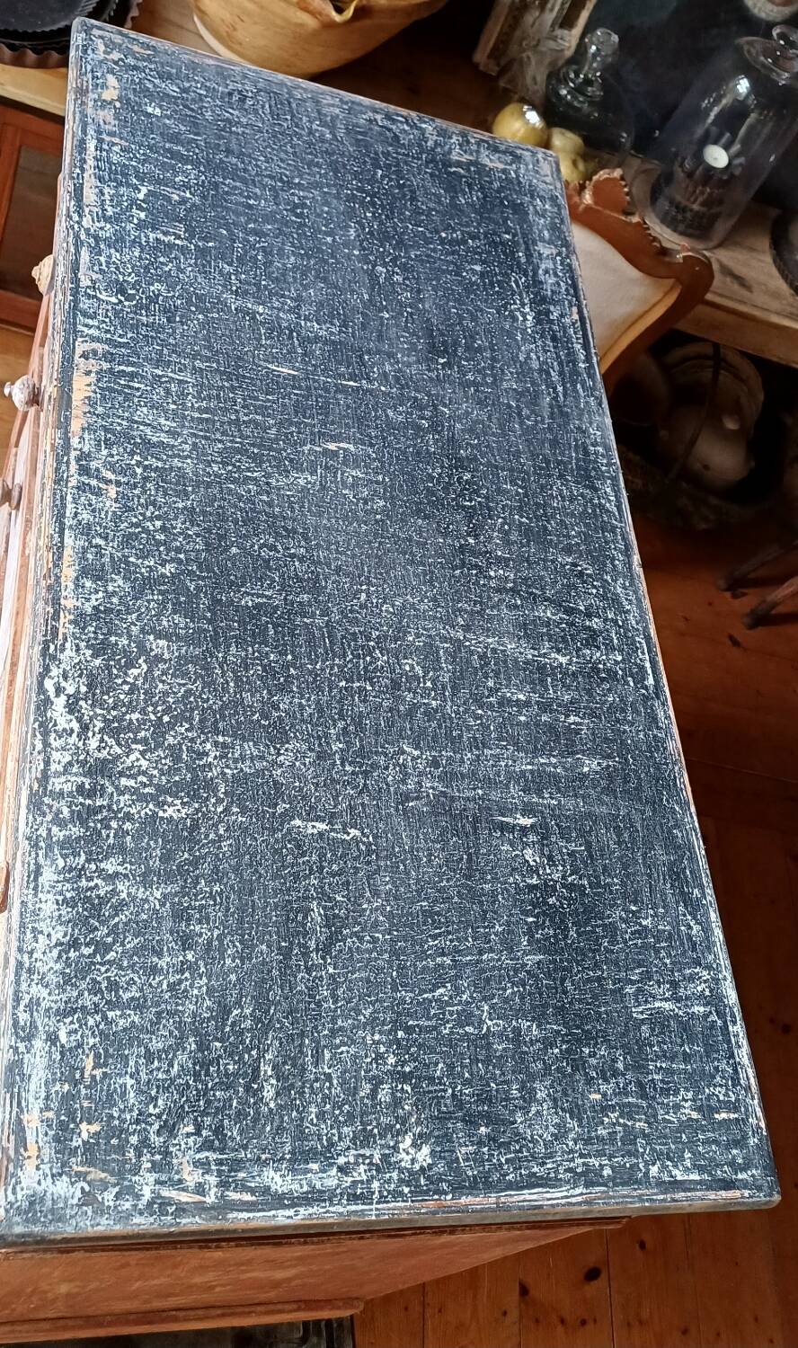 Antique piece of furniture with a grey patina.