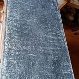 Antique piece of furniture with a grey patina.