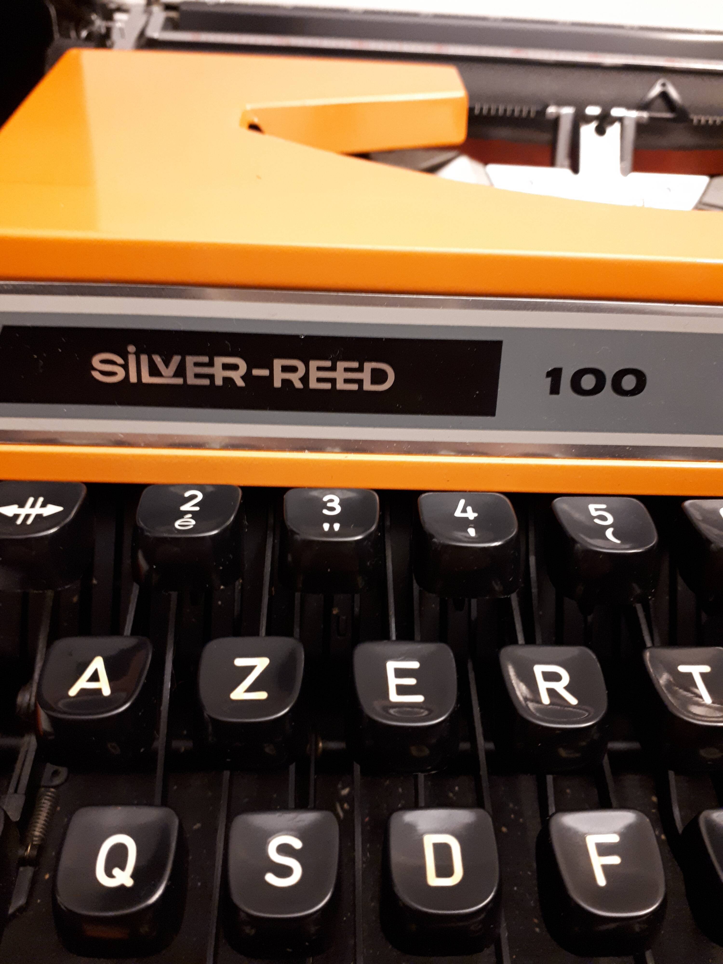 Vintage 70 orange Silver-Reed 100