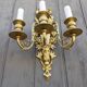 Pair of antique bronze wall sconces from the Napoleonic III era in the Louis XVI style.
