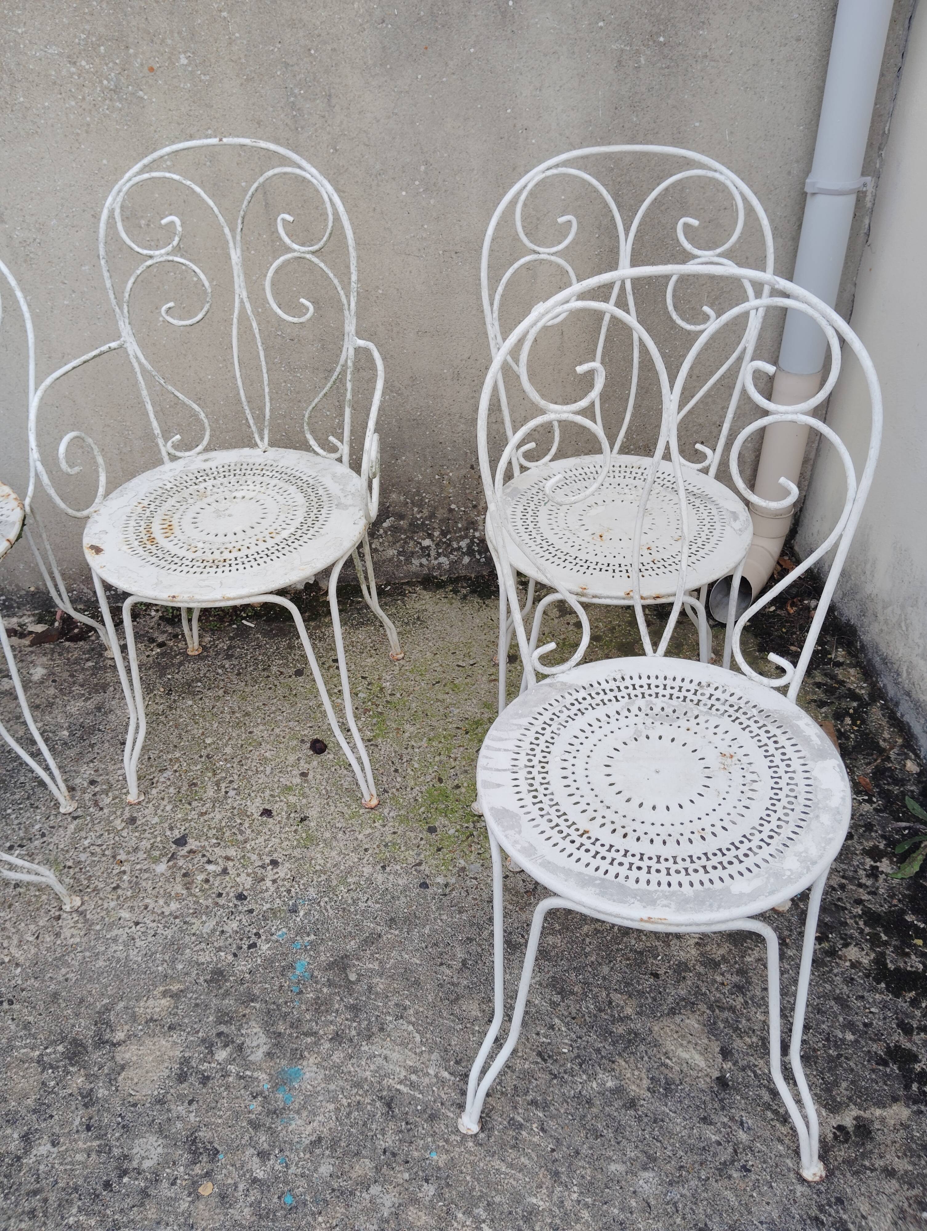 Wrought iron garden furniture from the early 20th century.