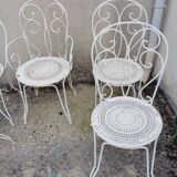 Wrought iron garden furniture from the early 20th century.