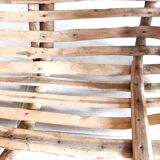 Old wooden harvest basket, slatted wooden basket, folk art.