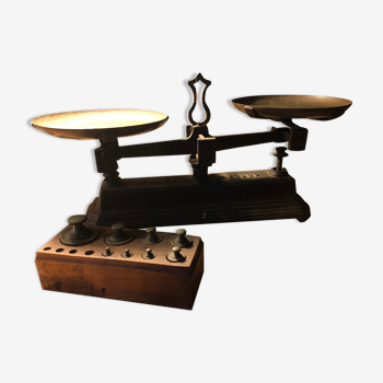 Old cast iron scale with weight