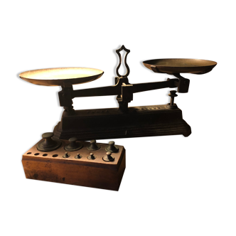 Old cast iron scale with weight