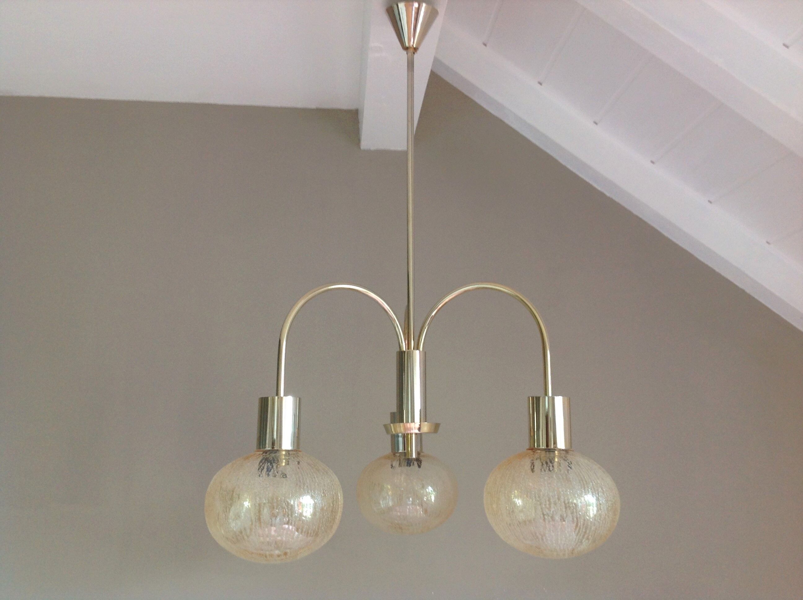 Three-globe brass chandelier in amber/vintage glass 60s-70s