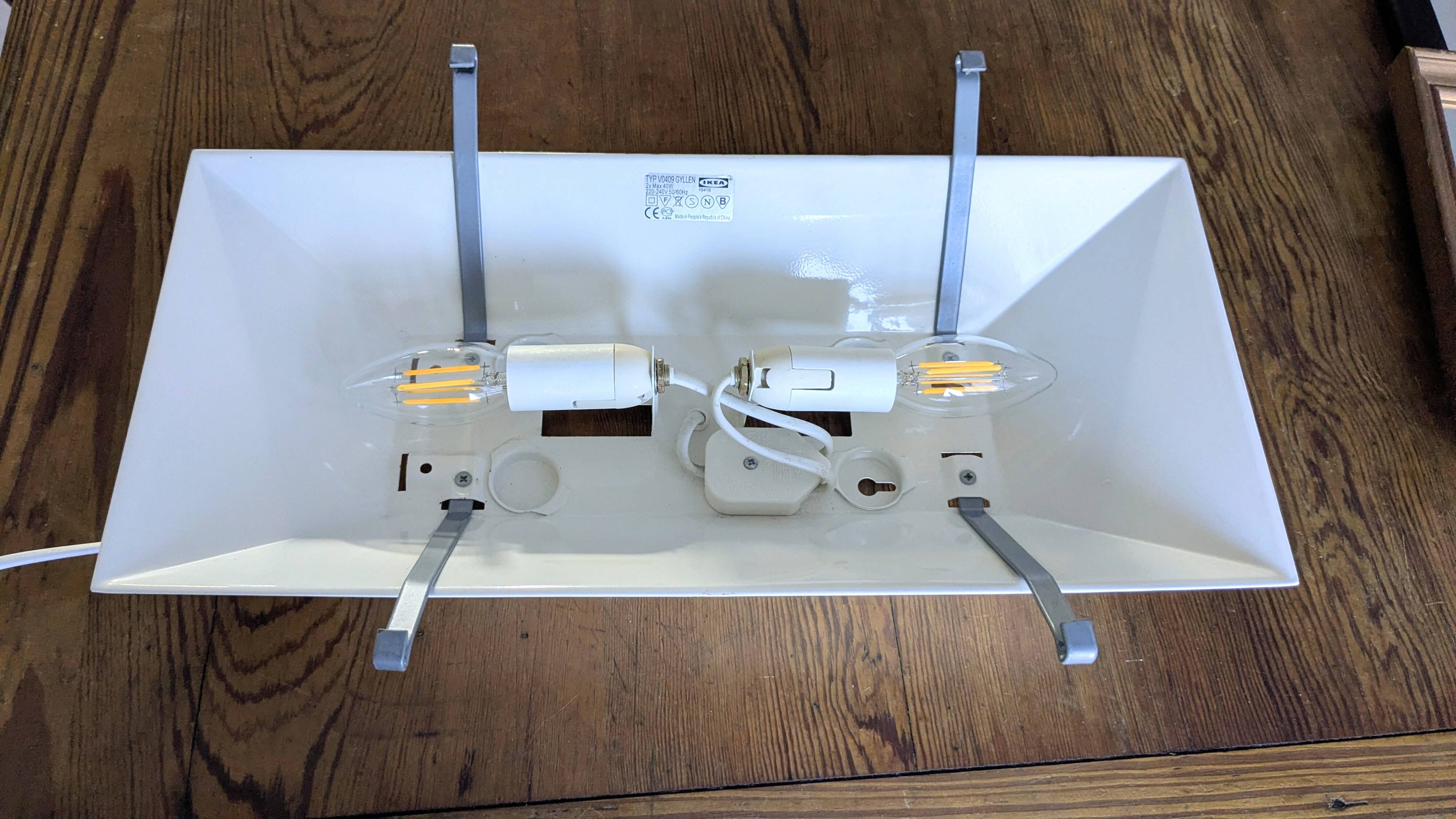 IKEA Gyllen wall lamp in decorated glass, Scandinavian design.