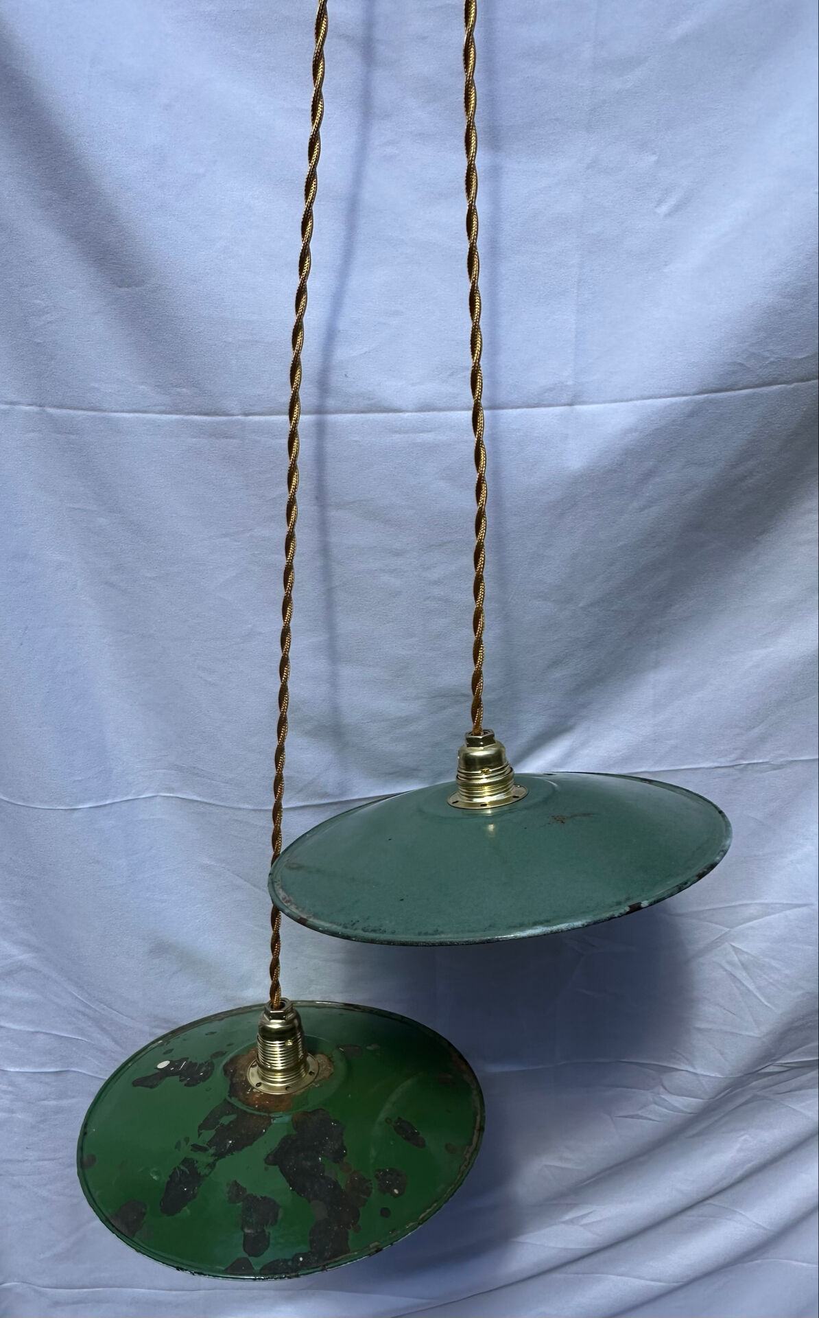 Old suspension pair in green and white enamelled sheet metal.
