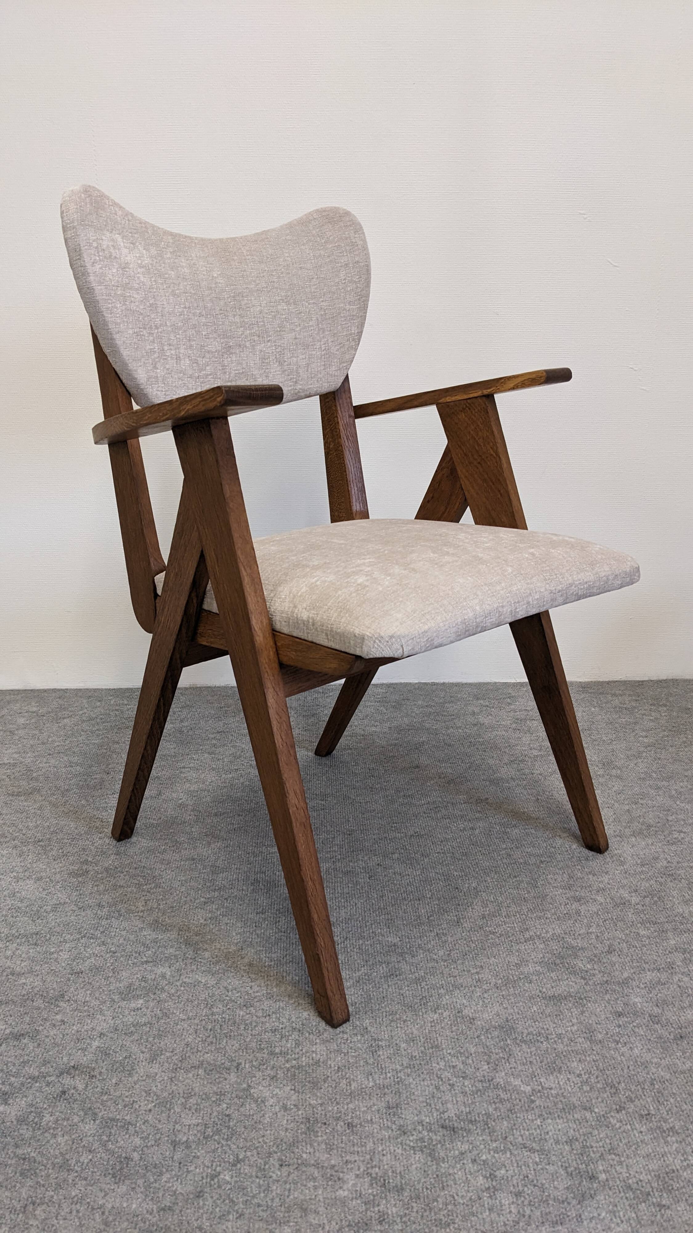 Pair of Scandinavian bridge armchairs in teak, Denmark circa 1950.
