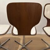 Lot of 4 vintage swivel chairs in the style of Arne Jacobsen.