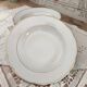 Set of 6 deep plates in fine porcelain from Bohemia with a gold rim.