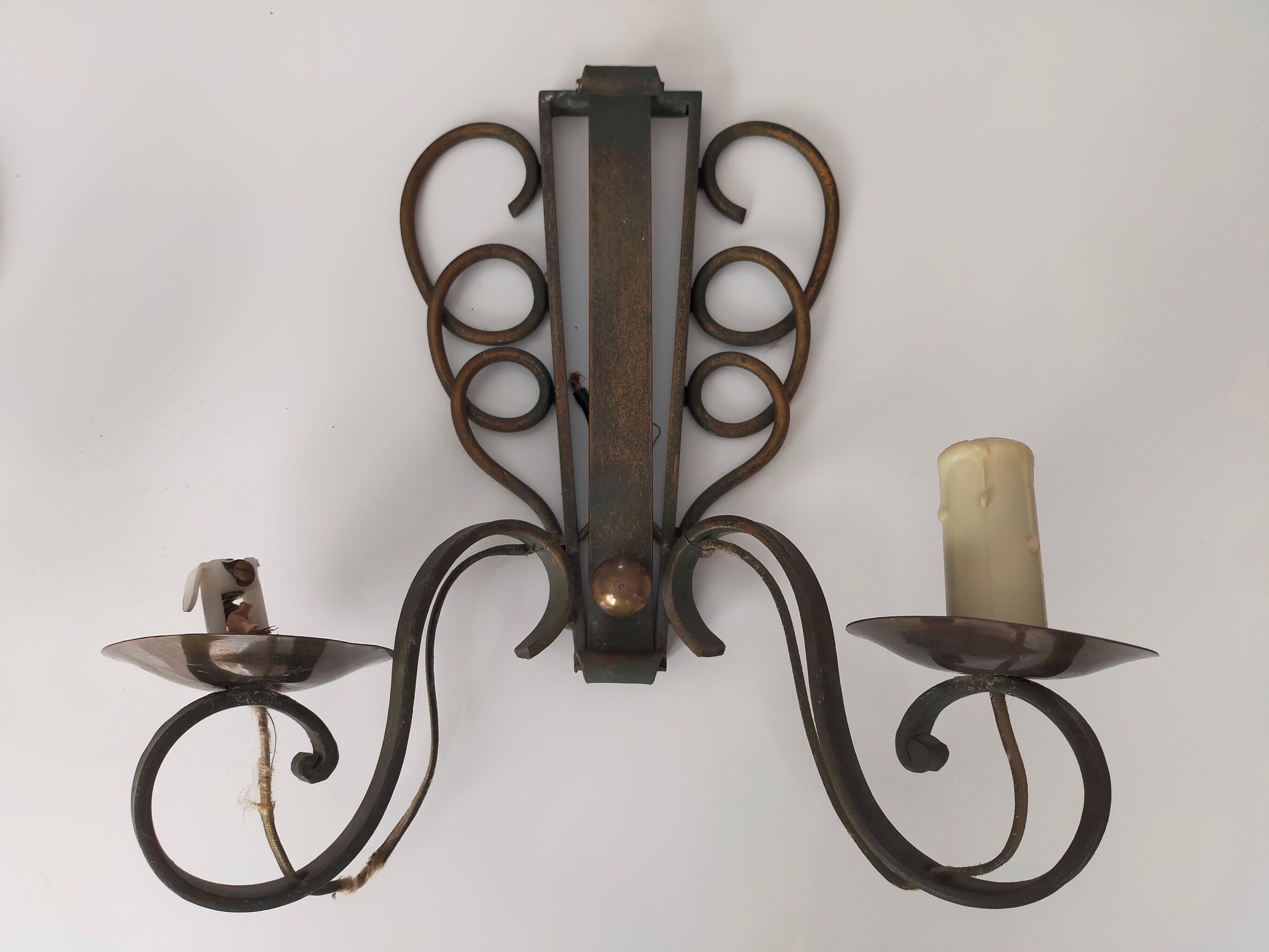 Pairs of vintage wrought iron wall lamps