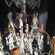 Old chandelier with tassels, bronze and crystal, 8 lights. Louis XV style.