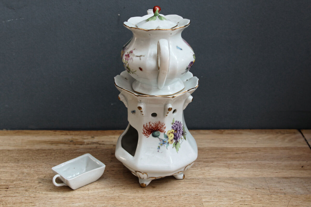 Old earthenware herbal tea maker
