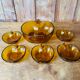 Salad bowl and apple raviers in amber glass 70 years