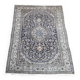 Large hand-tufted blue Persian rug