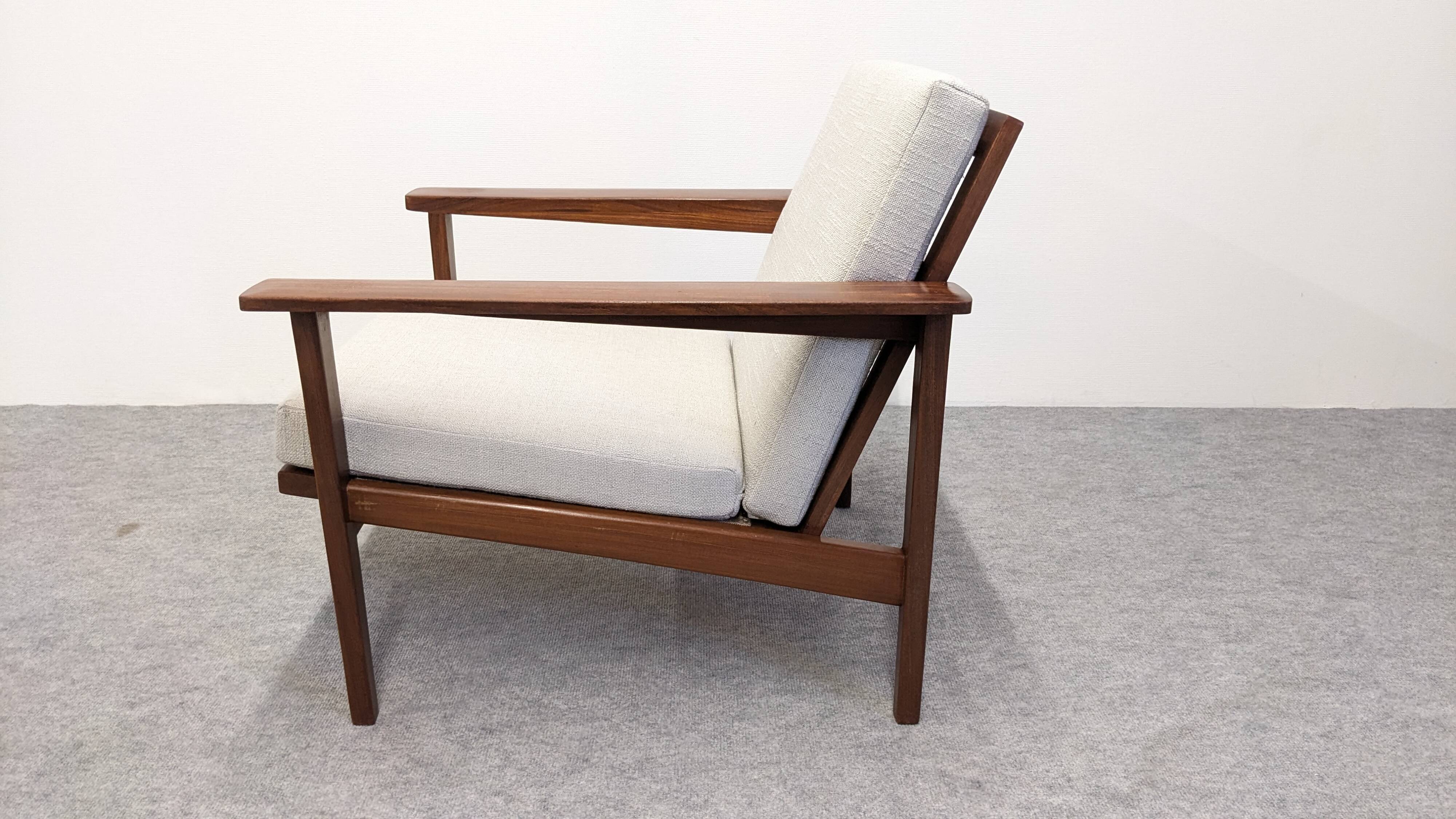 Pair of Scandinavian style armchairs in teak, France circa 1950.
