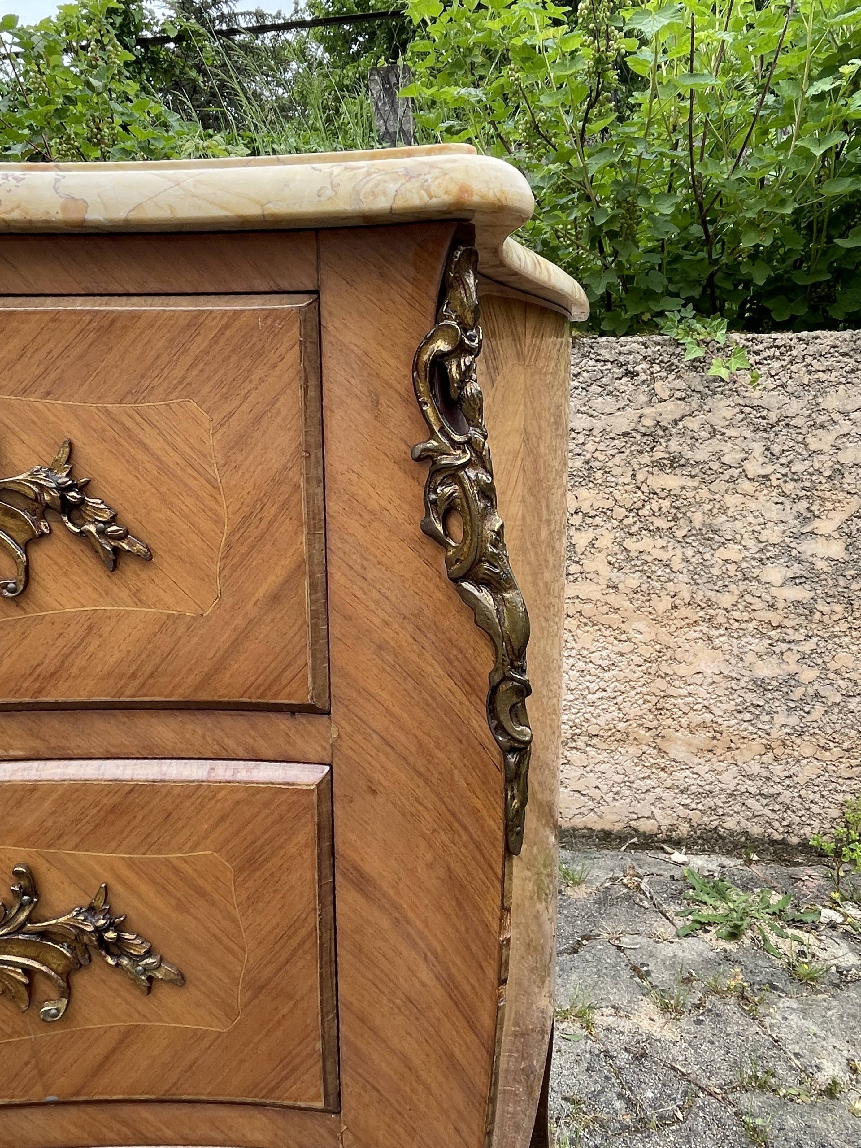 Louis XV style commode in marquetry, 20th century.