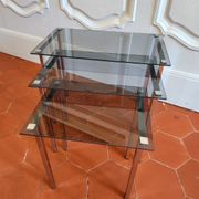 3 nesting tables from the 1970s in smoked glass.