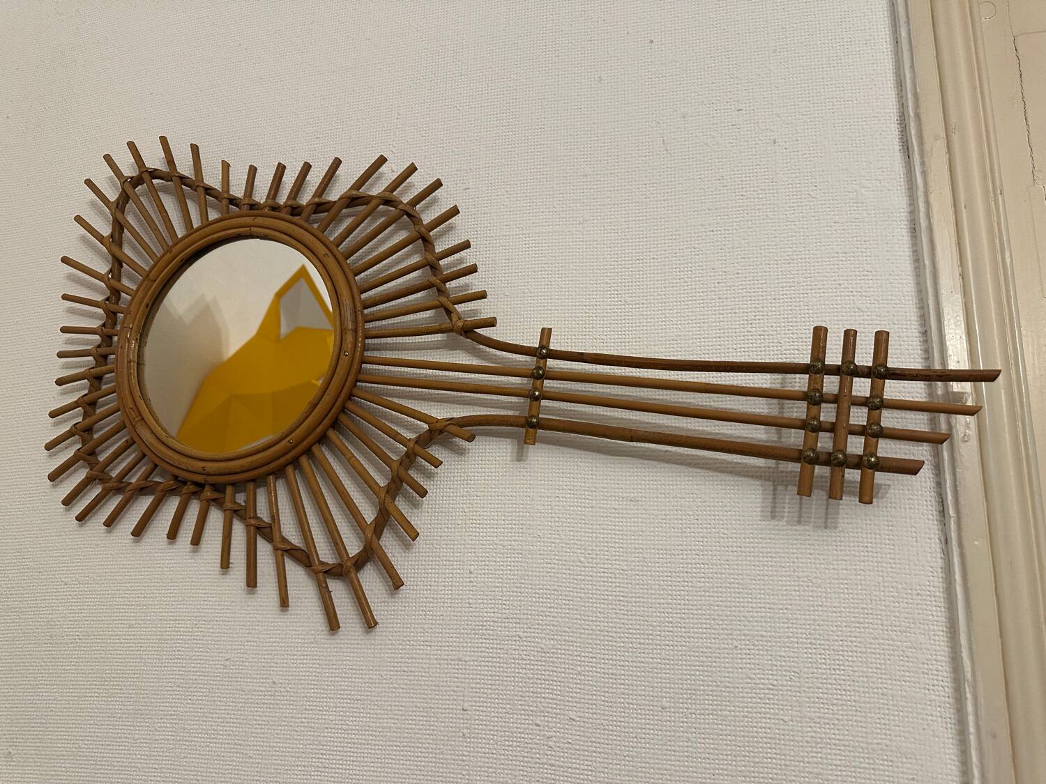 Vintage guitar-shaped rattan mirror
