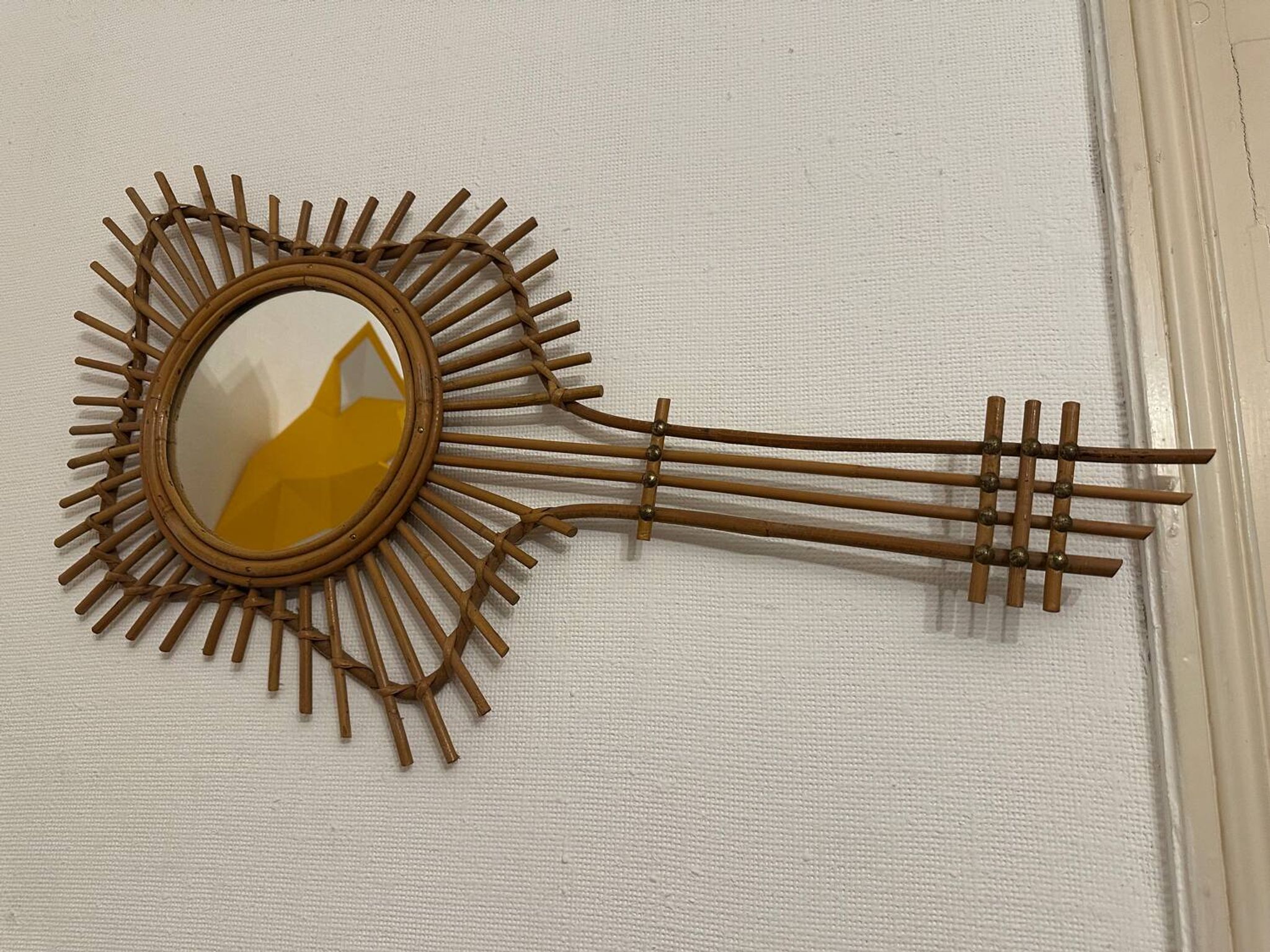 Vintage guitar-shaped rattan mirror