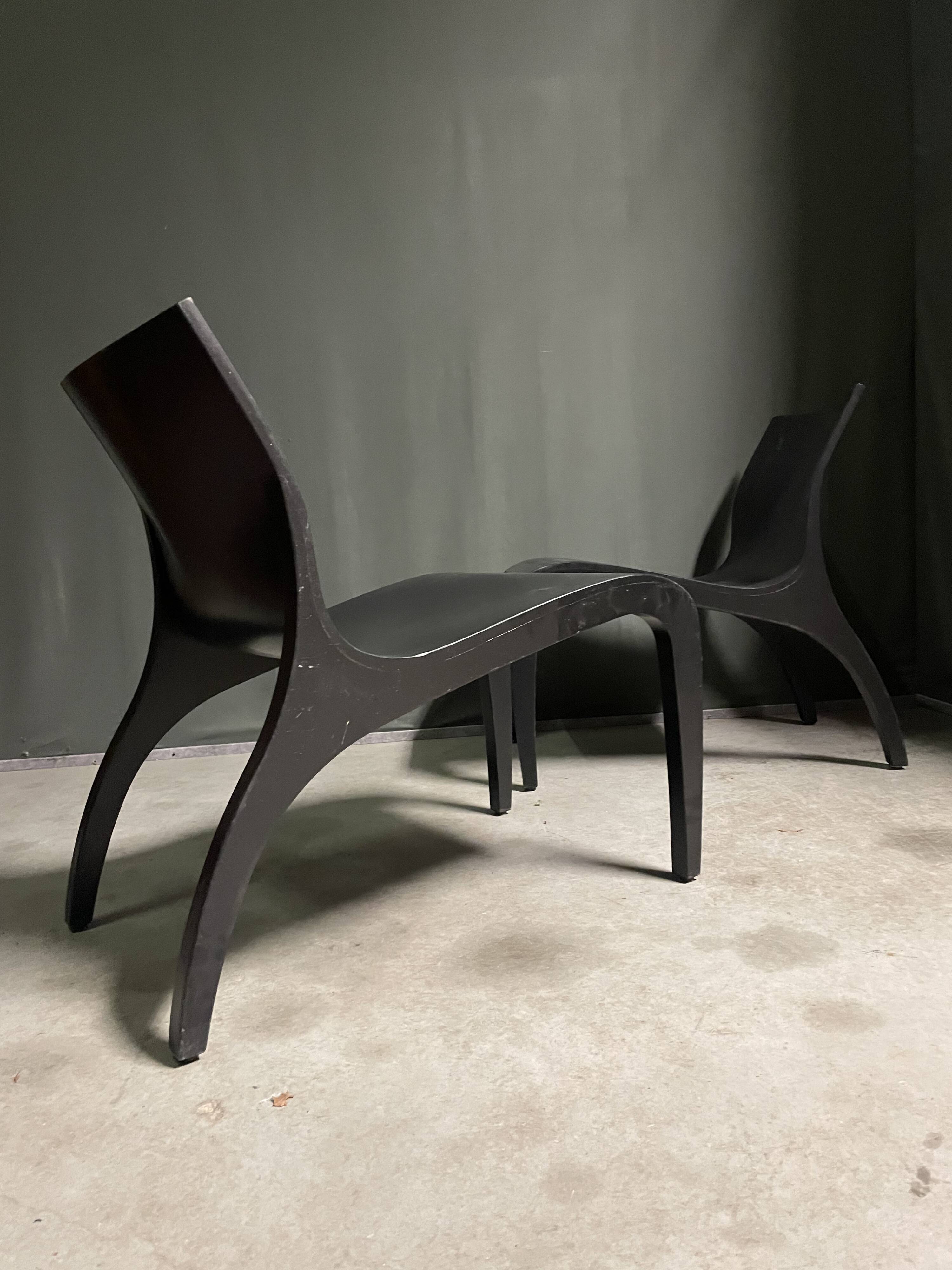 A pair Minimalist bent plywood lounge chairs