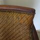 Woven rattan armchair and exotic wood in colonial style, 1980s.
