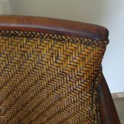Woven rattan armchair and exotic wood in colonial style, 1980s.