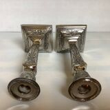 Pair of ornate silver candlesticks