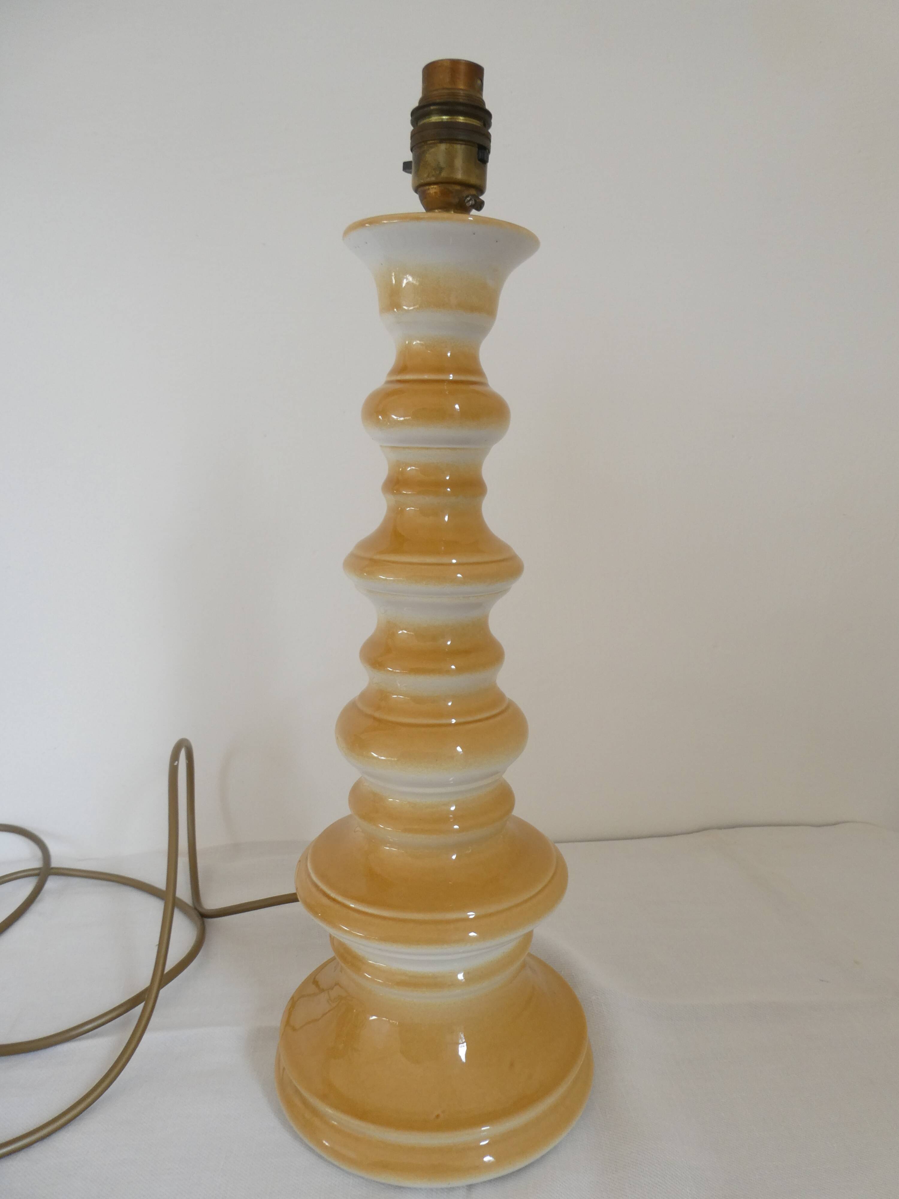 Large baluster-shaped lamp base in yellow and beige ceramic from the 1960s.