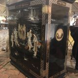 Asian lacquer cabinet with mother-of-pearl relief pattern