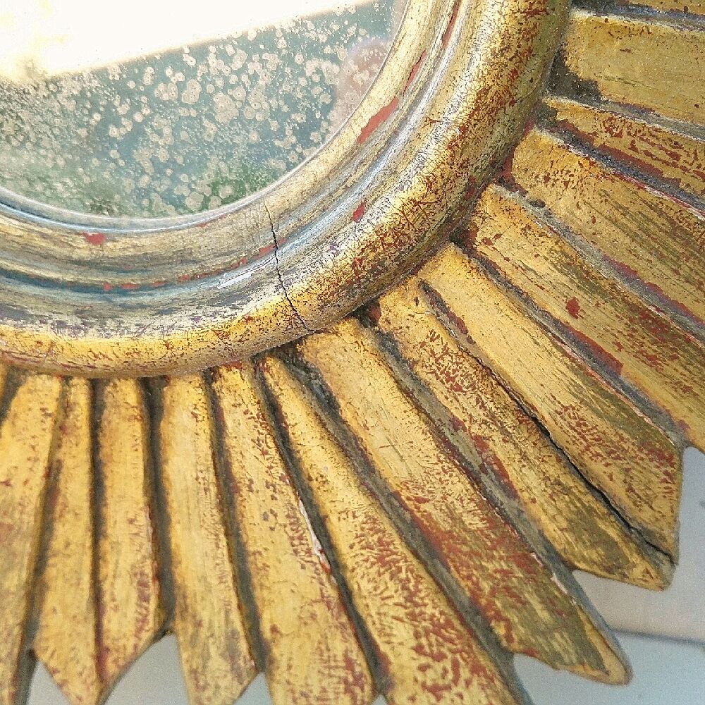 Sun mirror in gilded wood vintage decoration