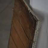 Wall mirror in tramp art style, hand-carved with a painted white frame, early 1900s.