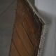Wall mirror in tramp art style, hand-carved with a painted white frame, early 1900s.