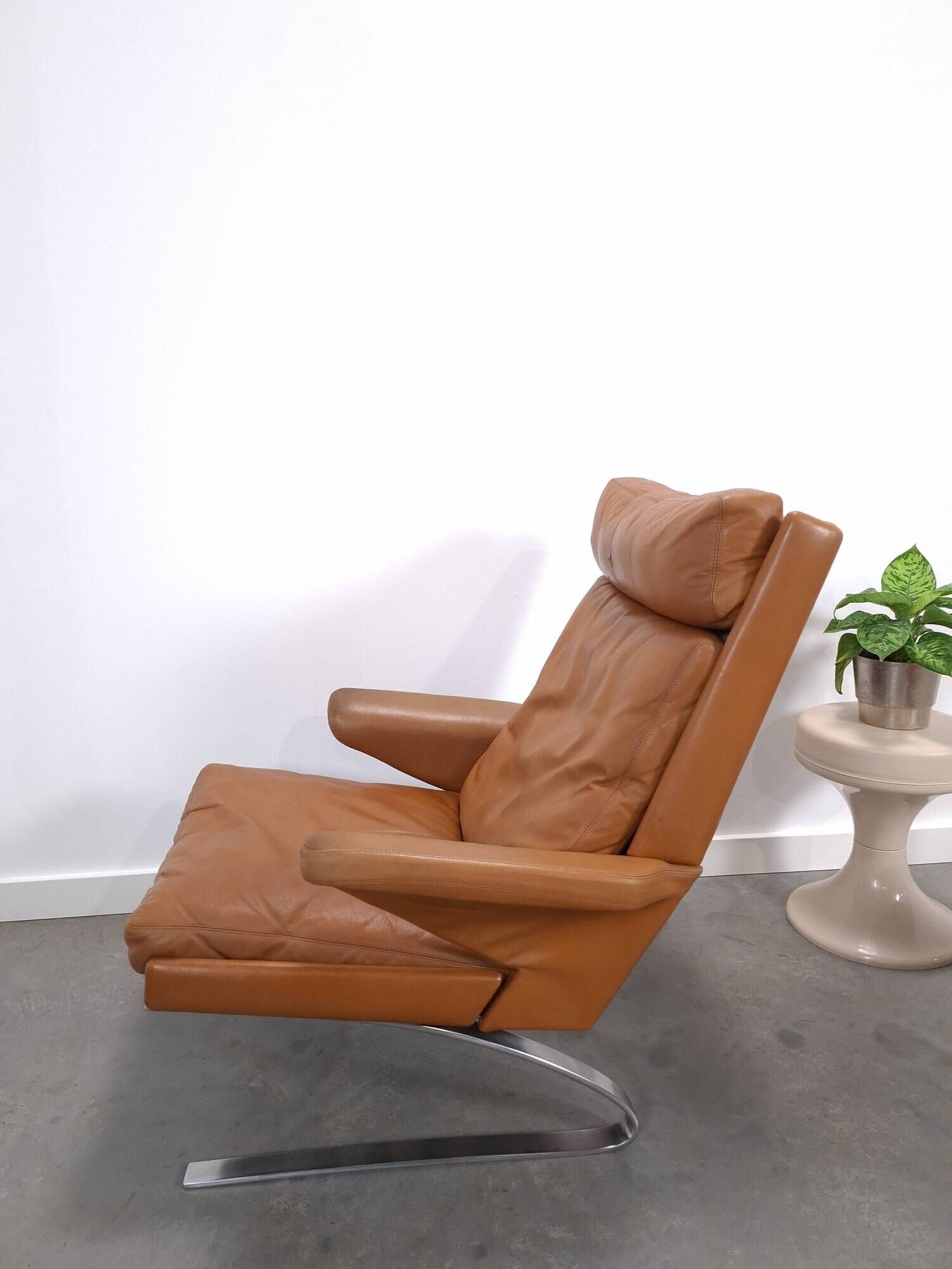 Vintage COR Swing armchair with ottoman, Reinhold Adolf, cognac leather