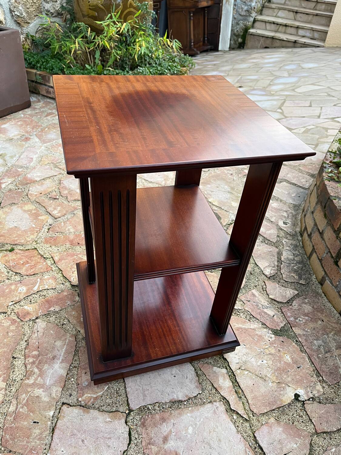 Vintage wooden shelf on caster legs