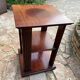 Vintage wooden shelf on caster legs