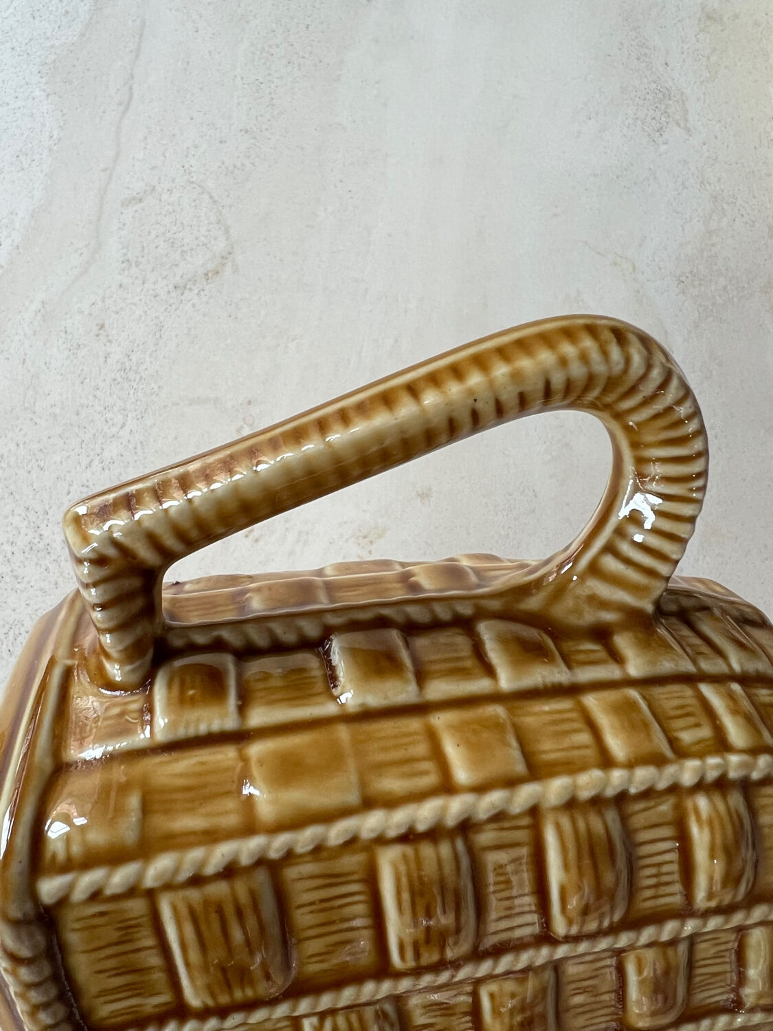 Ceramic pitcher braided pattern